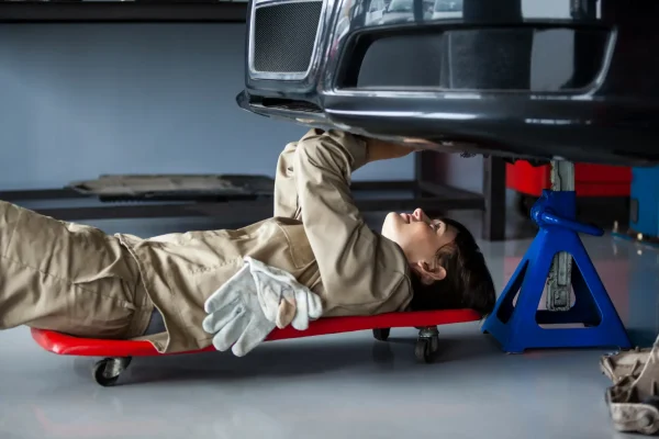 female-mechanic-repairing-car female-mechanic-repairing-car